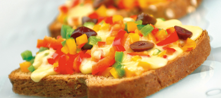 Open sandwich with peppers and melted cheese